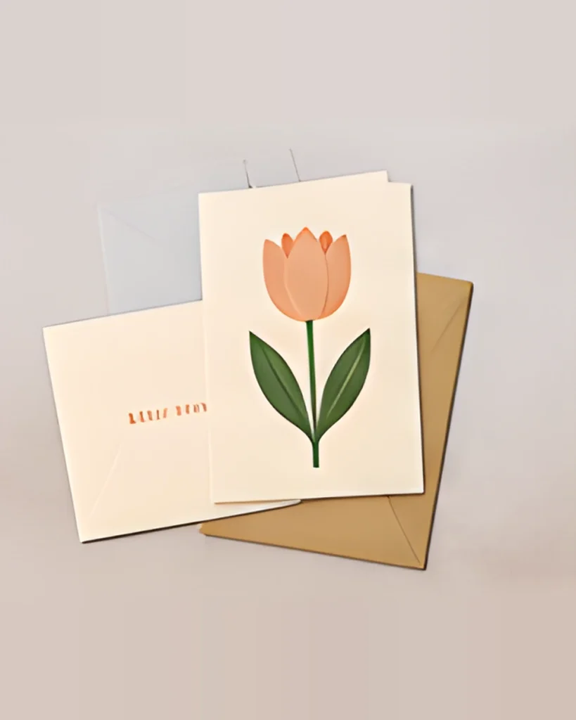 A set of greeting cards with a tulip illustration and kraft envelopes
